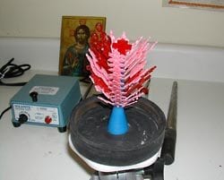 wax models attached to a stem to wax form a tree